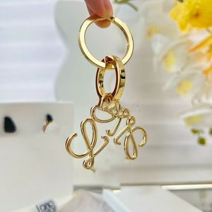 2023HandMade Designer Keychains Dragonne Multicolor -Schlüsselkette Männer Männer braune Lederbeutel Brieftasche Lanyard Platted Gold Accessoires Dragonne Keychain Buchstabe C28