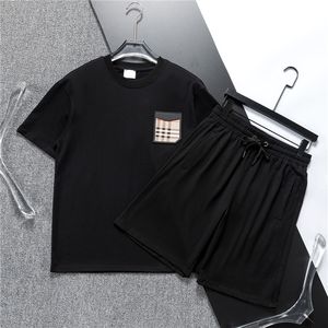 夏の男性とレディースショーツトラックスーツセット半袖Tシャツショーツプリント男性セットメンズブランド服