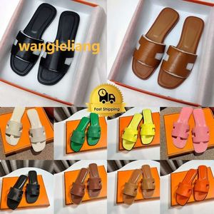 Projektant Oran Sandals Women Orang Claquettes Slajdes Oryginalne skórzane buty plażowe Płaskie obcasy Slowery Sandal Sandal Dams Fashuse Kapcie Hermys Nermes Hemers