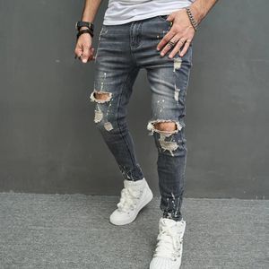 Mężczyźni Stylowe rozryte chude dżinsy ołówkowe spodnie streetwearu męskie dziury hip -hopowe rozciągnij Slim Denim Spodni 240417