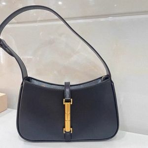 İngiltere tarzı koltuklu çanta kadınlar için lüks tasarımcı çanta çantası 2024 PU vintage kilit dekorati klasik küçük omuz i1al#