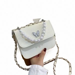 FI Solid Color Pu axelväskor Kvinnor Pearl Butterfly Handväskor Totes Female Travel Crossbody Sling Pouch 88 MH#