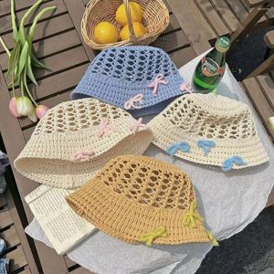 Boinas Moda de cor sólida Hollow Out Straw Hat fofo Bowknot Tecido Trendy Beach Sol protetor solar Cap lindo