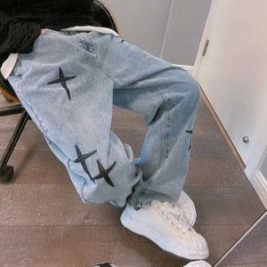 Kvinnors jeans herrar jeans brett ben last byxor gata kläder män väskor koreanska mode löst montering rak herrkläder y2k hip-hop stil män byxor yq240423