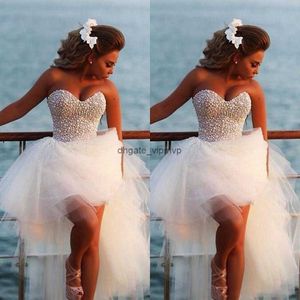 Urocze suknie ślubne plażowe 2022 Sweetheart Full Pearls Top Diamonds High Low Tiul Bridal Sukni