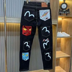 Embroidered New Slim Fit Mo Ling Fu Shen Chao Men's Jeans Hong Kong Handsome Straight Leg Pants 440716