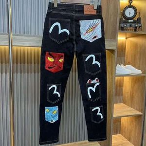 Broderad ny smal fit mo ling fu shen chao mäns jeans hong Kong stiliga raka benbyxor 440716