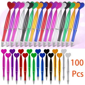 Długopisy 100pcs w kształcie serca w kształcie pióra Nowość żel Pens Pens