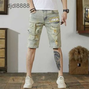 Nowy letni dżins męski z dziurami pięć punktów spodni modna marka Patchwork Slim Fit Shorts