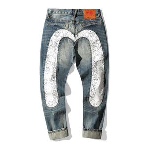 男性用の新しい秋の冬のズボン、ゆるくてまっすぐな脚のbe食の特大のジーンズ、大きな白いパッチワーク、くぼんでいる印刷物397169