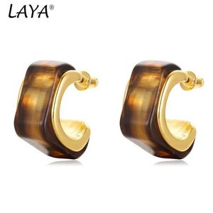 Charm Amber Earrings الخريف والشتاء الفاخرة الفاخرة الفريدة على شكل C 2024 جديدة على الأسلوب الساخن الراتنج الفرنسي أقراط W Y240423