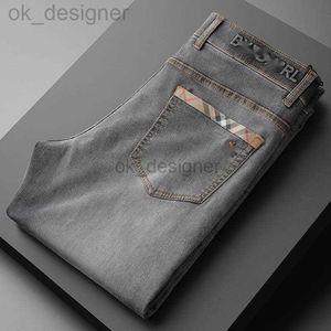 Mäns jeans designer high end mode warhorse grå tvättade elastiska jeans för mäns smala passform små fötter casual trend mäns byxor