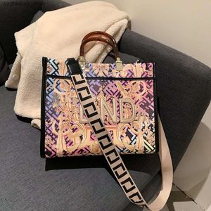 Família de bolsas femininas de designer de bolsas de luxo letra impressa portátil Bolsa feminina Novo ombro de ombro único europeu e americano de alta qualidade