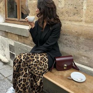 Spódnice Leopard Satynowa spódnica kobiet wysoki talia Vintage Midi Woman moda elegancka na 2024 lato