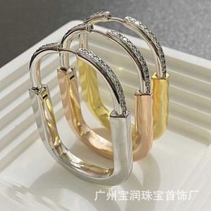 Projektant wyrafinowania Tiffayss Nowe kolczyki zamka i Yang Chaoyues same premium 18K Rose Gold Diamond Bluckle z lekką luksusową głową 66YW