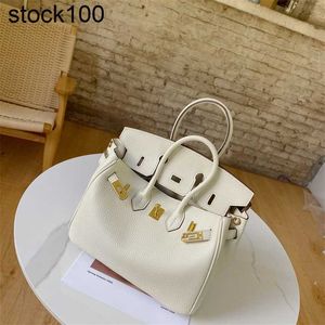 Milk Platinum Bag 2024 Shake White Head Camada Vaca Bolsa Litchi Padrão Mulher Saco Mulher ombro único Crossbody Handheld Bag pequeno