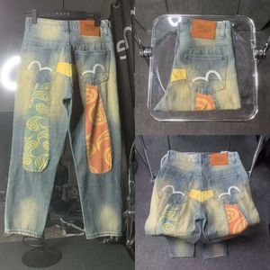 Chaopai Fushen Nya tvättade jeans broderade och tryckta skarvade jacquard mandarin anka raka ben byxor 801120