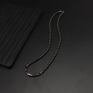 Collane fredde ematite magnetica nera rotonda collana tigereye in pietra con perle in acciaio inossidabile per uomini