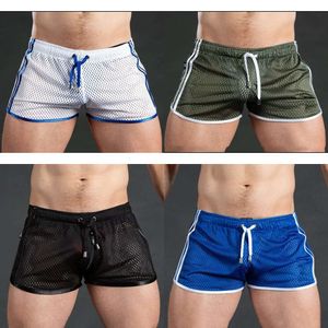 Casual Men Gym Fiess Treinando shorts Sexy Mesh Sports Belra de praia Roupas masculinos Novo confortável Y200901