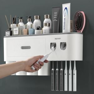 Huvuden magnetisk adsorption inverterad tandborstehållare väggmonterad dubbel automatisk tandkräm dispenser rack badrumstillbehör