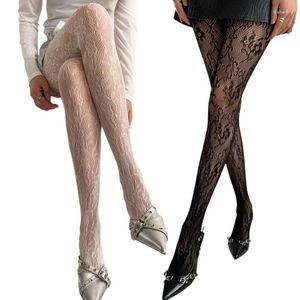 Kvinnliga strumpor kvinnor franska jk vintage blommor jacquard fisknät tights strumpor sexiga ihåliga spetsar ren strumpbyxor