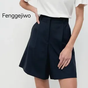 Shorts femininos fenggejiwo tecido de lã Ultra-fine em forma de parte superior do corpo super boa.O logotipo dentro está tecido com