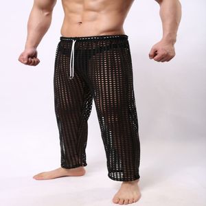 Sexiga herrbyxor Sleepwear Se genom Big Mesh Lounge Pyjamas Bottoms Loose Trousers Low Rise Male Sexy Wear316Q