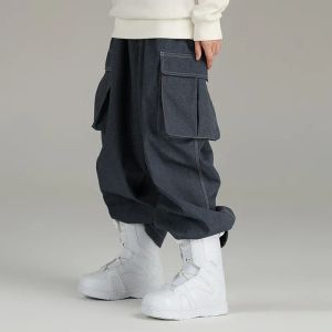 Pantaloni pantaloni da sci uomini pantaloni invernali donne snowboard indossare abiti da neve da sci all'aperto femmina impermeabile jeans da carico largo largo hipster