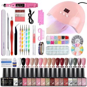 Kits de arte na unha 35pcs kit de perfuração LED por atacado com dicas de acrílico Ferramentas de polimento colorido de gel de gel para unhas salão