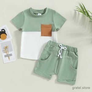 衣料品セット夏の幼児の子供たちの服セットパッチワークカラーポケット半袖Tシャツ+ショートパンツ新生児カジュアルスポーツウェアの衣装