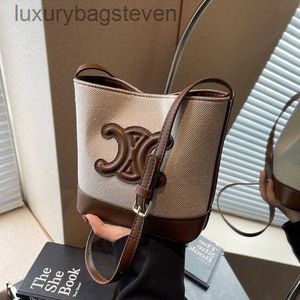 Bolsas de designer de celular sênior para mulheres para mulheres saco de balde outono inverno novo single singro de ombro de textura tendência versátil bolsas com logotipo original