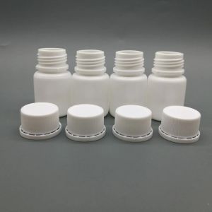 ボトル100pcs/lot 20ml HDPE白い空のプラスチックピルボトルを改ざん具体的なキャップ、良質の空のカプセルボトル