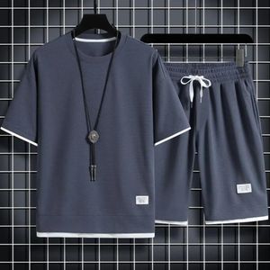 2024 set di waffle da uomo estivo set di maglietta casual e pantaloncini set maschili abiti sportivi maschili a colori solidi tute sciolte dimensioni 3xl 240411