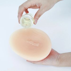 エンハンサーの乳房形態接着剤とレムーバーブラブのアクセサリーは、シリコン接着ボディグルー50ml接着剤リムーバー接着剤を取り除く