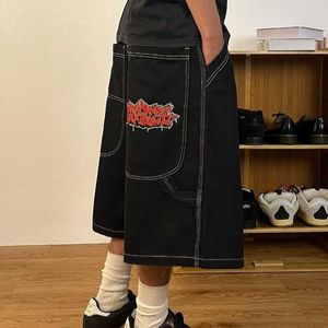 High street skateboard byxor mönstrade broderi hiphop denim shorts t240424