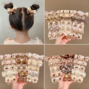 アクセサリー10pcs/set baby cartoon hairband girls chide bow Hair ties princess弾性輪バンドヘッドバンドキッズヘアアクセサリー