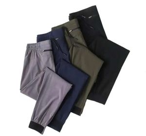 Ll calças de corredor masculinas longas esportes de ioga de ioga rápida ginástica seca bolsões de ginástica calça calça calça mensual elástico elástico designer de fitness roupas de moda 436656