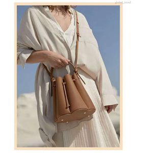 Polen Bag Tote Bag Umhängetasche Designer Crossbody Bags Blütenbeutel Französisch Tasche Echt Leder Umhängetasche Crossbody Tasche Tragbarer Eimer Bag Großer Kapazitätsbeutel 909