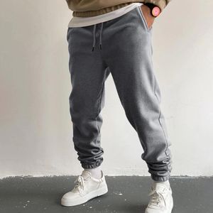 Pantaloni maschili da uomo alta strada per il tempo libero sport sciolti con pizzo a colori solidi su maglione chino slim fit