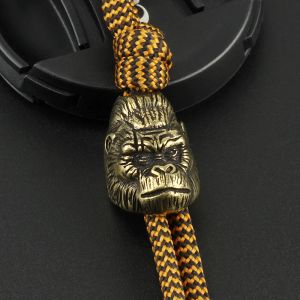 Paracord mässing personlighet apa knivpärlor paraply rep pärla utomhus kniv orangutan paracord hänge