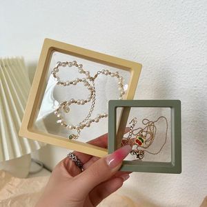 Bolsas de joias 1pcs transparentes peças elásticas de filme de exibição de anel de anel de anel de anel de pulseira de colar de cabelo de armazenamento de cabeceira caixa de barro