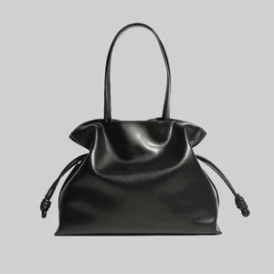 Niche 2024 Design Large Capacity Single Shoulder Bag with Solid Color Drawstring Cuffs Underarm Cowhide Lucky Womens