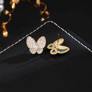 Hochversion modische High-End-vielseitige Temperament Van Butterfly Ohrringe Frauen Asymmetrisch blauer Emaille Full Diamond Jewelry