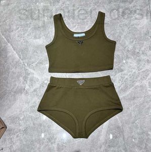 Kvinntankar Camis Designer Swimming Suit, sportig stil, kort hängslen Vest, triangelbyxor, kvinnors fasta färg bomullsstickning, 2024 Summertrend Ezk2