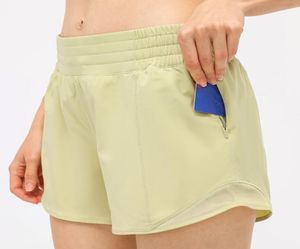 91 gebaute kontinuierliche Drawcord -Yoga -Shorts Frauen Jogginghose mit versteckten Reißverschluss -Seitentaschen Highlise Short Hosen Breat5496777