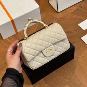 Lyxvarumärke handväskor designer kvinnors väskor vår/sommar ny produkt cf kycklinggul handtag klaffpåse singel axel crossbody