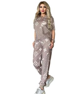 Summer Novo calças de duas peças Tracksuit Women Singer impressão casual Casual Mangas curtas Jaqueta fina e calça de moletom define roupas casuais roupas