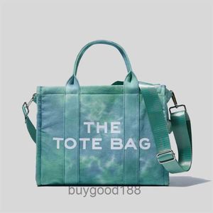 Designer Women's Tote Bag Tie Tinted Womens Shopping portatile Shopping alla moda una spalla stampato nuovo stoffa alla moda