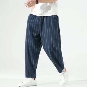 Pantaloni pantaloni da uomo a strisce casual harem pantaloni maschio in stile giapponese sciolto maschi vintage maschi di donna in cotone in lino cotone streetwear