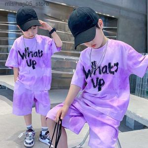 Set di abbigliamento Nuovi ragazzi Set di asciugatura rapida Summer Set Childrens Street Short Maniche T-shirt+Two pezzi Sports Baby Sliose Q240425